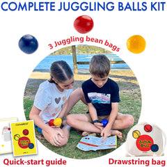 Juggling balls kit with juggling bean bags, quick-start guide, and drawstring bag on a beach background.